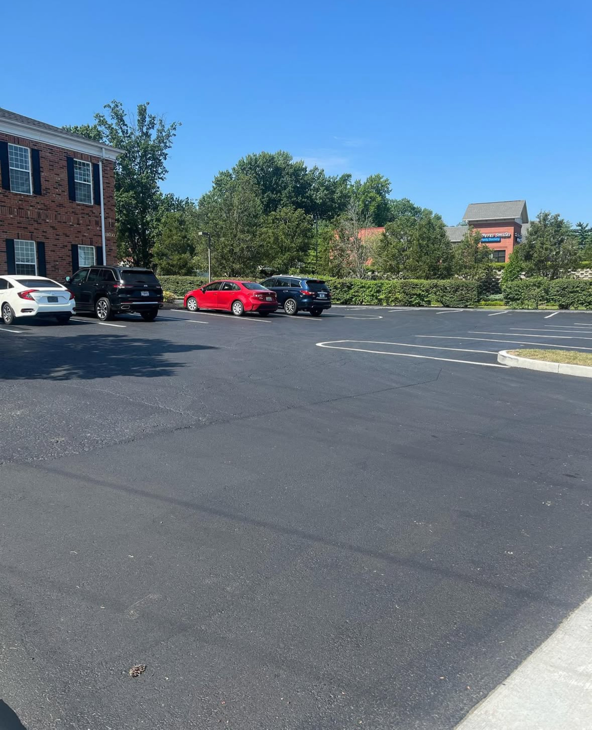 Office parking lot after sealcoating