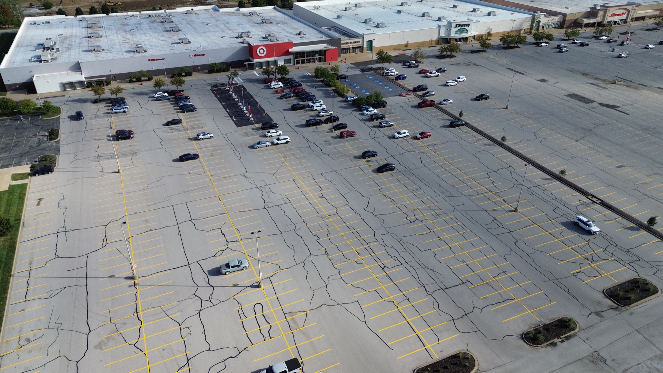 Aerial view of crack filling across the Target parking lot